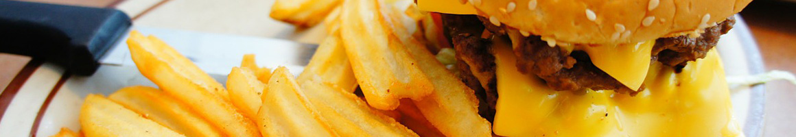 Eating Burger Soul Food Southern at Redman's Chicken & Rib restaurant in Geneva, NY.